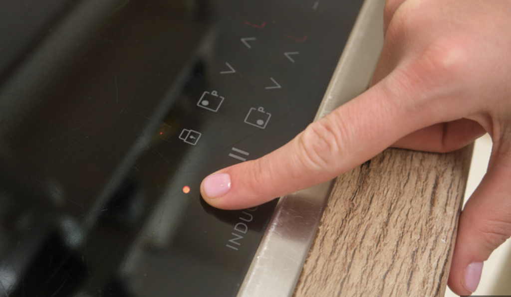 cooktop lock symbol on control panel